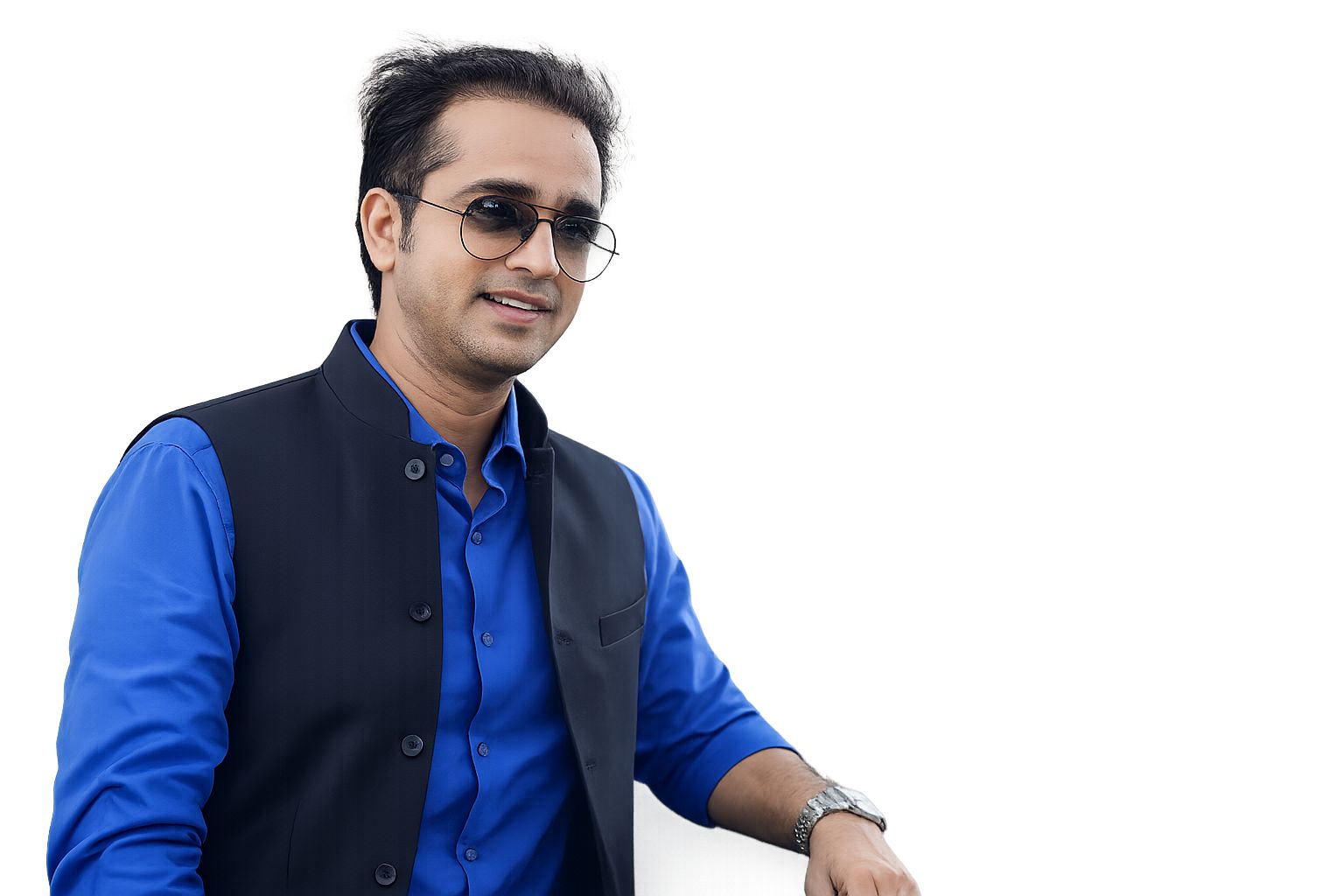 Vineet Mishra, NariZari founder sitting at desk in an editorial portrait